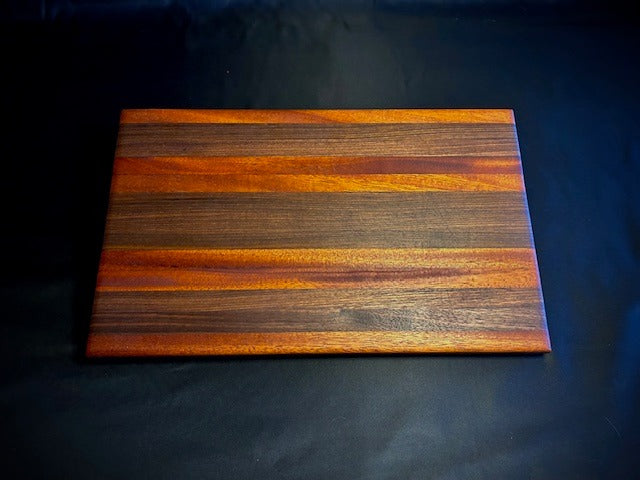Handcrafted Walnut & Mahogany Cutting Board – Striped Elegance