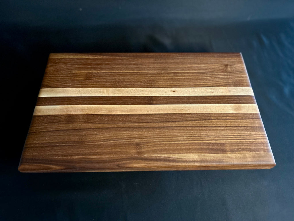 Handcrafted Walnut Cutting Board with Maple Inlay